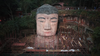 Statuie uriaşă de Buddha varsă lacrimi văzând crimele împotriva umanității