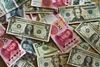 Profesor chinez: Beijing se grăbește să înlocuiască dolarul cu yuanul