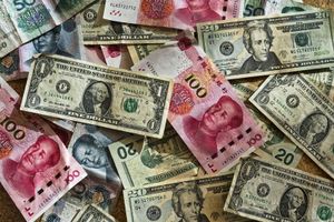 Profesor chinez: Beijing se grăbește să înlocuiască dolarul cu yuanul